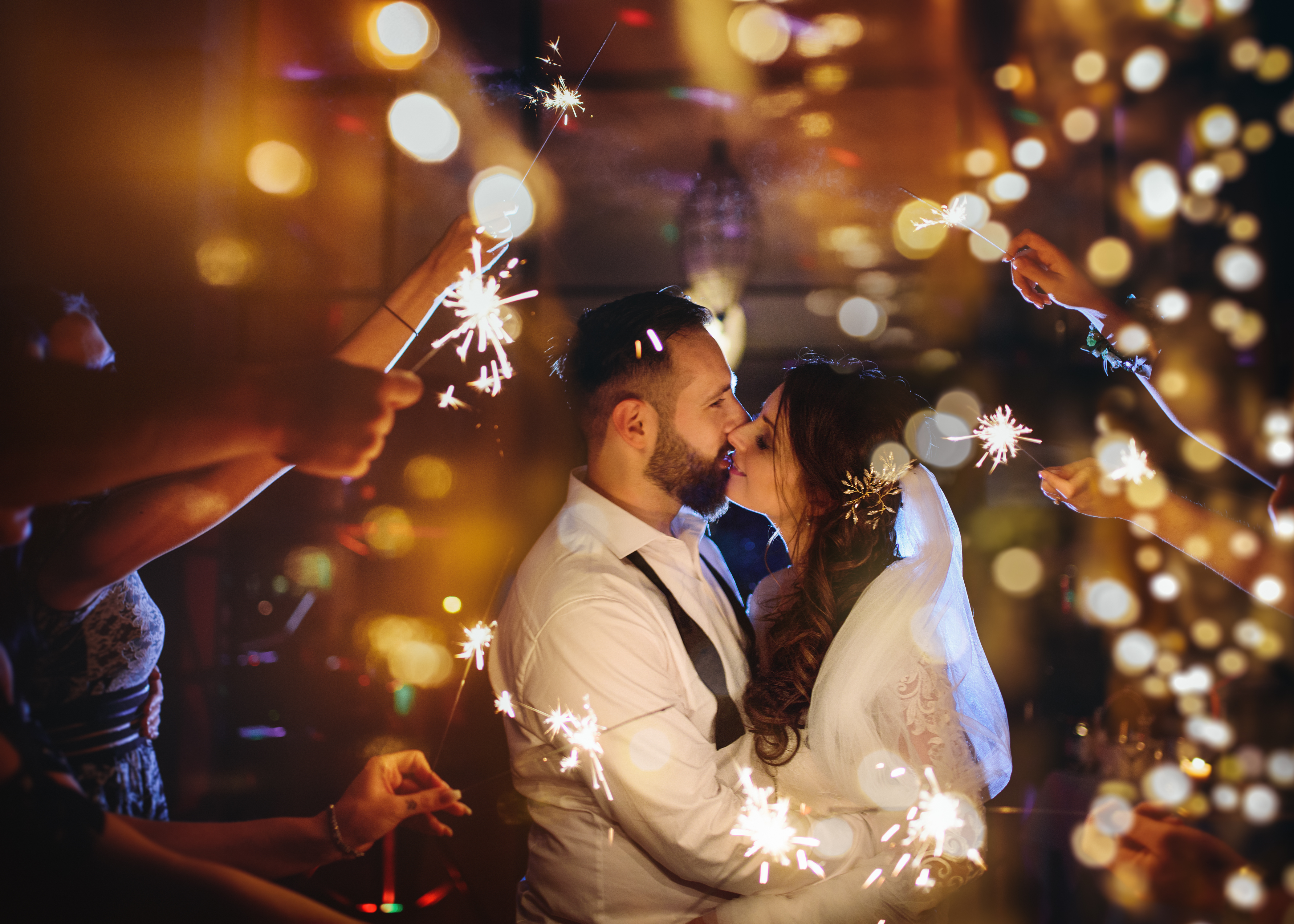 Couple surrounded by sparklers at wedding reception Melbourne