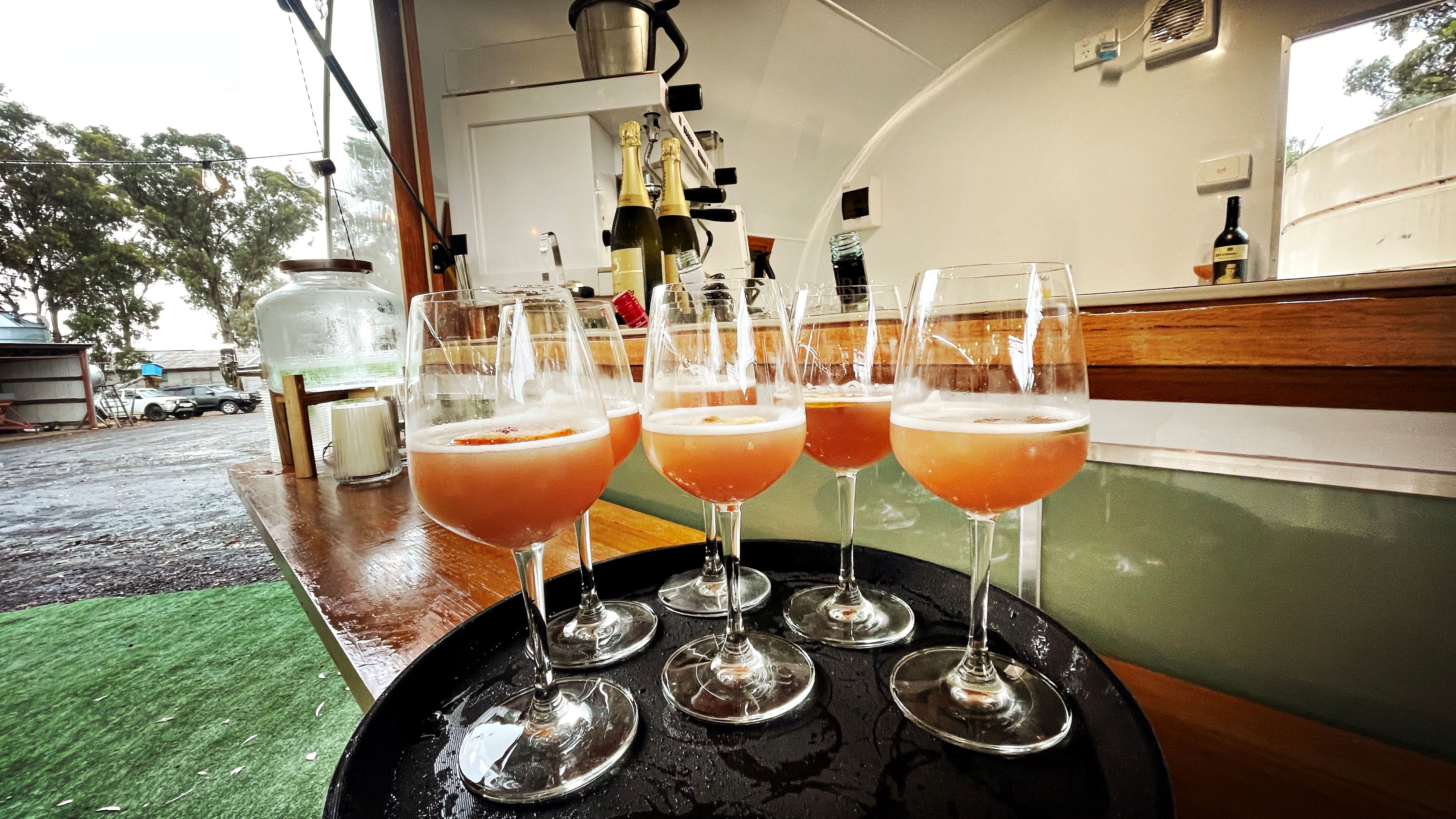 Champagne cocktails on tray during wedding cocktail hour